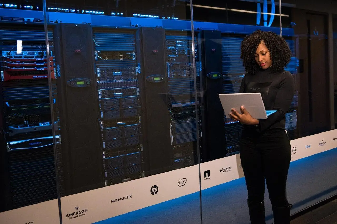 Young woman in a data center